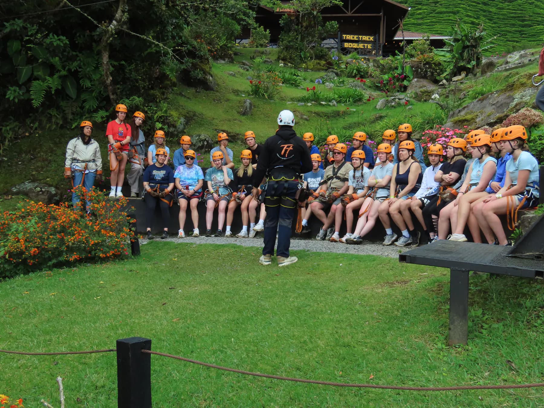 Guests sitting in a row for the safety briefing before the Boquete canopy tour